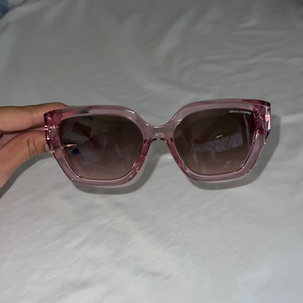 Pink Armani Exchange sunglasses.